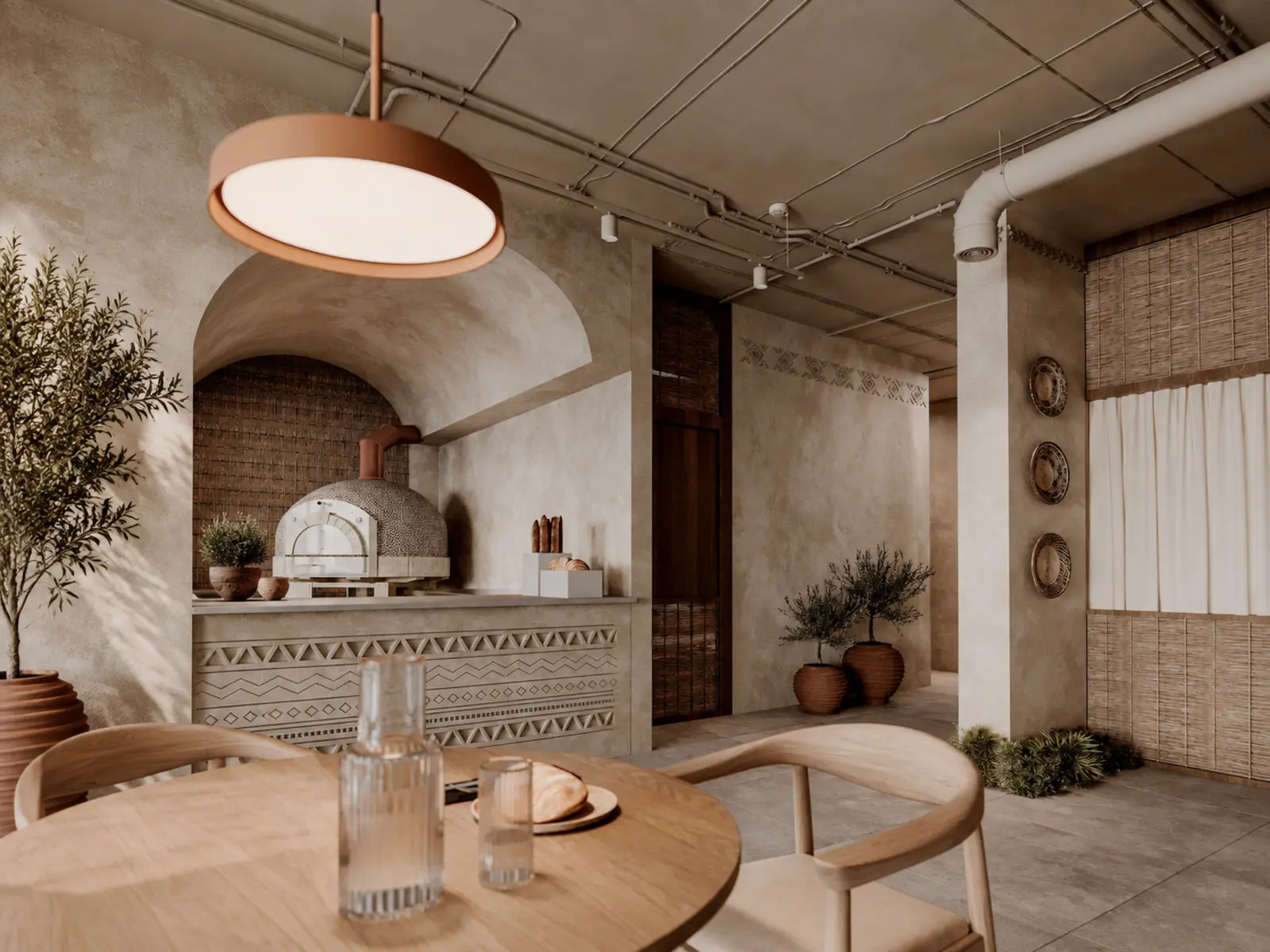 Vue du four artisanal, de la table ronde et des murs texturés du café