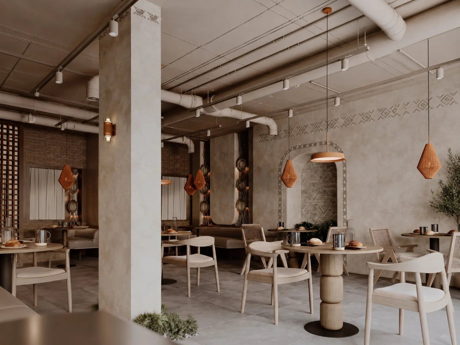 Salle du café avec colonne structurale, tables rondes et reliefs muraux