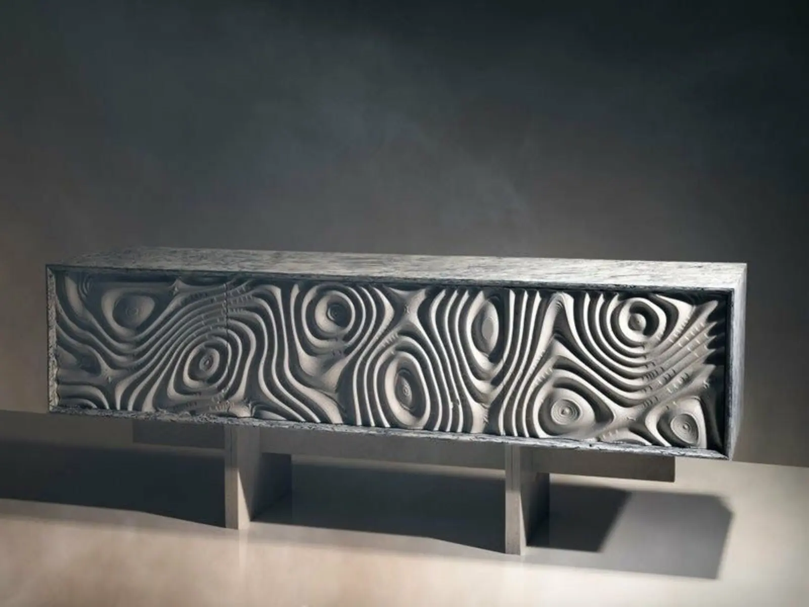 Console sculpturale métallique aux motifs concentriques